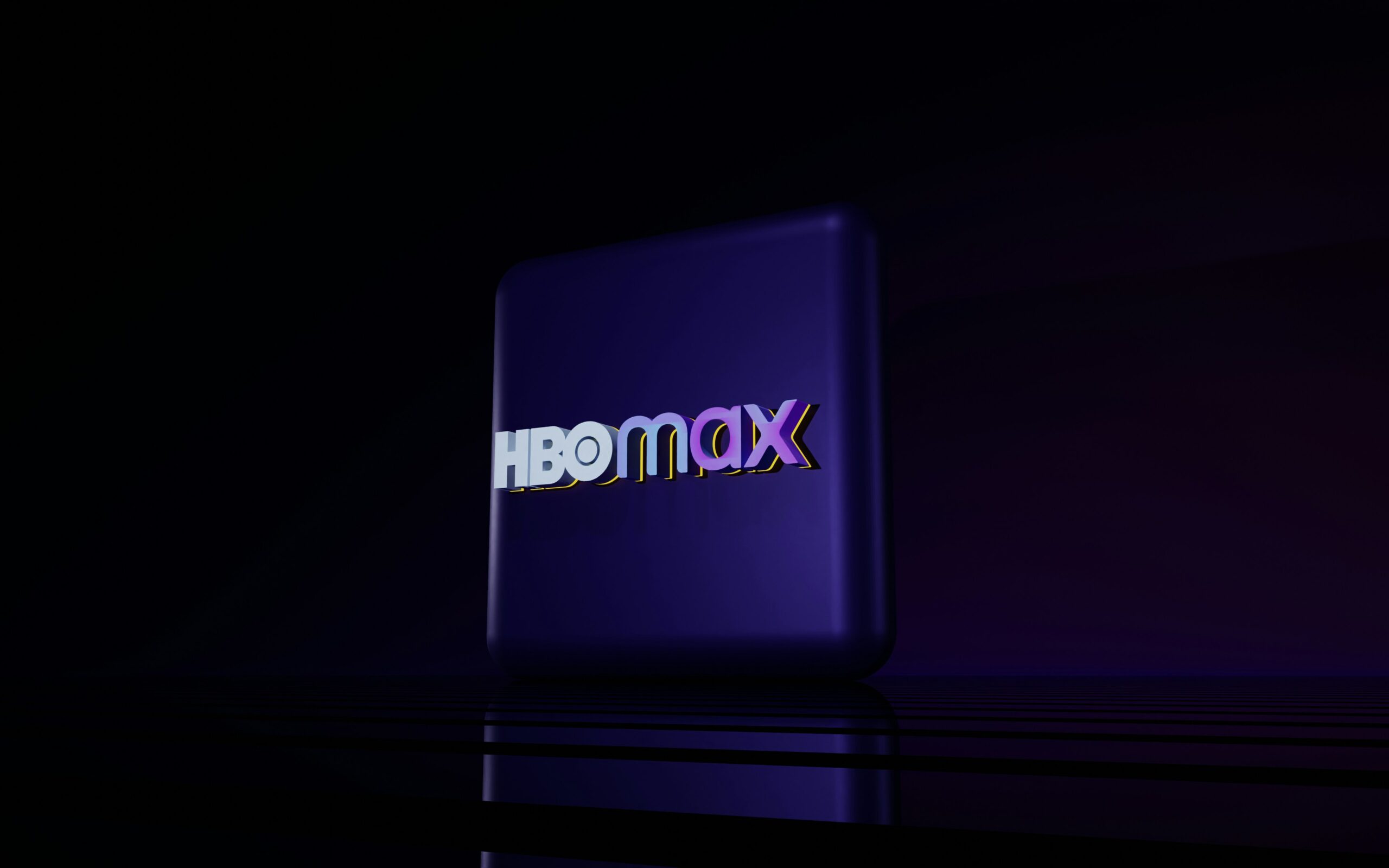 HBO Max streaming service logo displayed on a sleek purple gradient screen against a dark background. The iconic brand identity features modern typography with a clean, minimalist design. Perfect representation of digital entertainment platforms, streaming media services, and contemporary brand design in the entertainment industry.